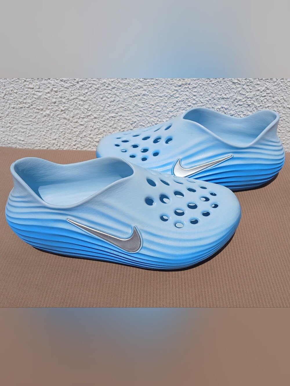 Nike ReactX Rejuven8 Unisex Clogs Light Blue Silver Swoosh M6/ W7/6Y